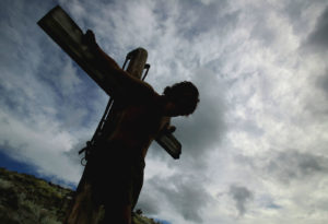 Silhouette of Christ on the cross of Calvary.