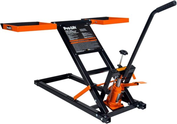 An orange and black lawnmower and ATV lift with a hand crank that allows a person to lift a piece of equipment in the air, or they can use their power drill to lift equipment in the air.