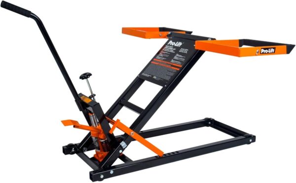 An orange and black lawnmower and ATV lift with a hand crank that allows a person to lift a piece of equipment in the air, or they can use their power drill to lift equipment in the air.