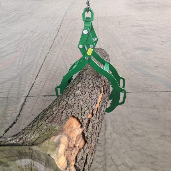 The claw tongs wrapped around a large log while being hung by a chain.