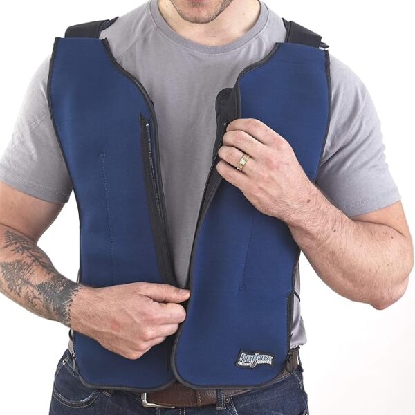 A guy wearing a blue circulating cooling vest is zipping it up.