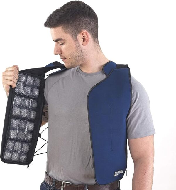 A guy wearing a blue circulating cooling vest has one side pulled open to look at the inside.