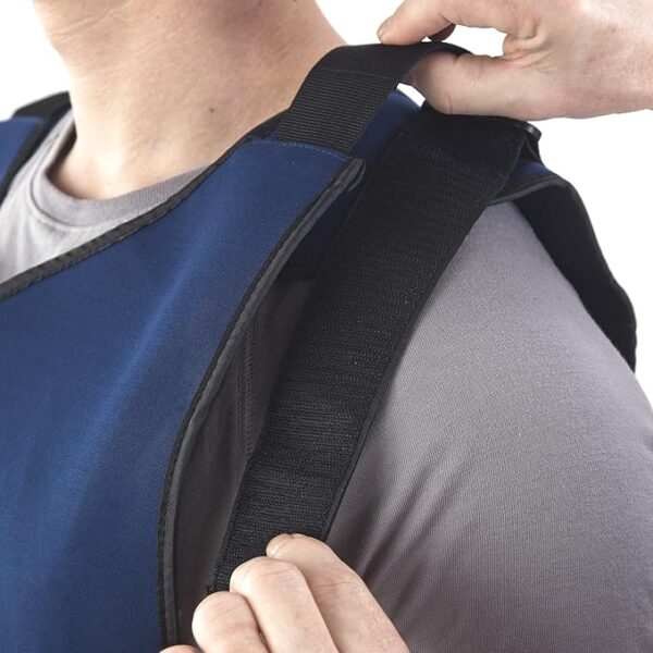 Someone is showing the shoulder strap of the cooling vest.