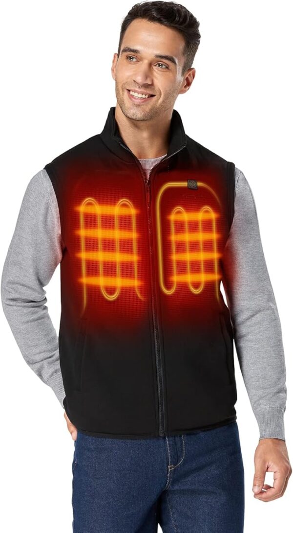 A guy is wearing a black heated vest.