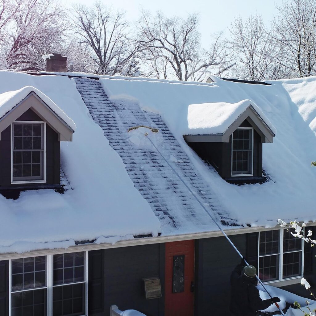 Snow scraper allows the removal of snow from a house, semi truck, camper or mobile home roof avoiding the use of ladders for workers with arm or leg impairments.