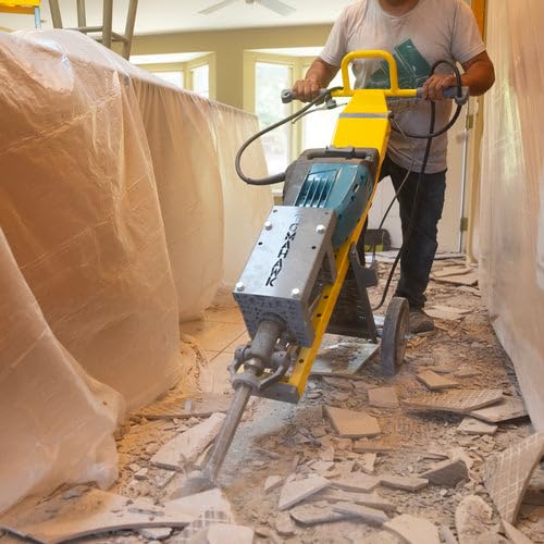 Jackhammers can be heavy! Use of a trolley can make this job easier.